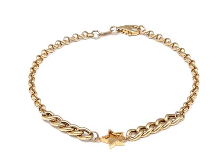 Pulsera eslabón combinado con aplicación motivo estrella en oro amarillo 14 kilates. on Sale