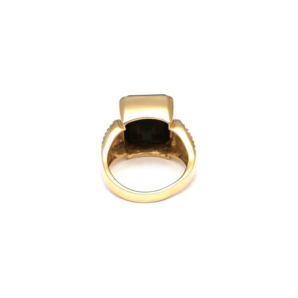 Anillo acanalado con ónix en oro amarillo 14 kilates. Discount