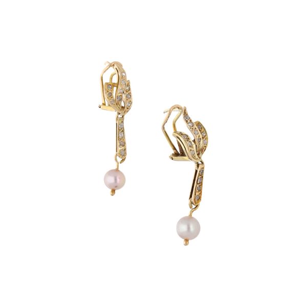 Aretes articulados con diamantes y perlas en oro amarillo 14 kilates. on Sale