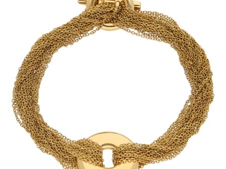 Pulsera trece hilos eslabón cruzado con aplicacion firma Tiffany & Co. en oro amarillo 18 kilates. For Sale