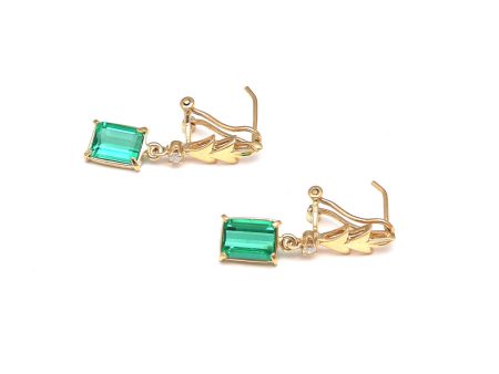 Aretes diseño especial con obsidiana verde y circonias en oro amarillo 14 kilates. Online now