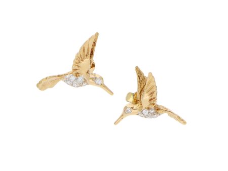 Broqueles estilizados motivo colibrí con diamantes en oro amarillo 18 kilates. Fashion