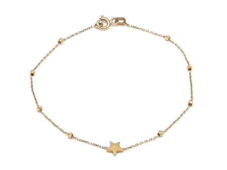 Pulsera eslabón cruzado con esferas y aplicación motivo estrella en oro amarillo 14 kilates. Supply