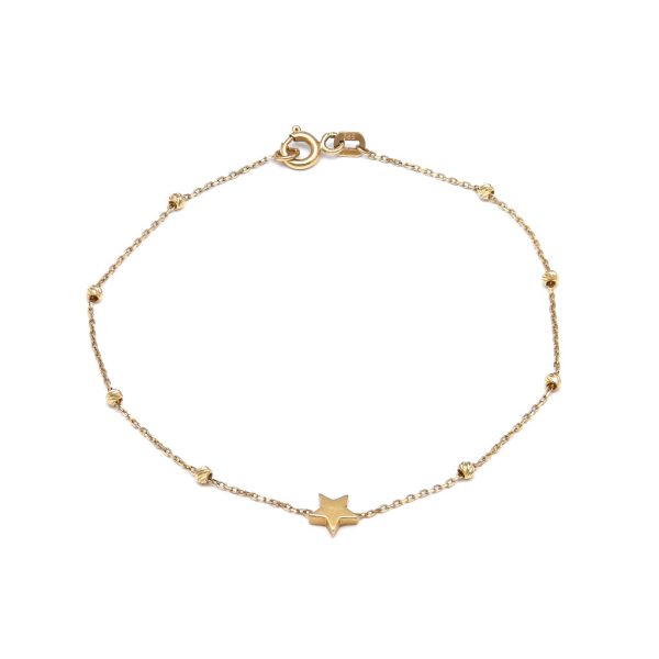 Pulsera eslabón cruzado con esferas y aplicación motivo estrella en oro amarillo 14 kilates. Supply