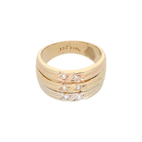 Anillo acanalado con circonias en oro amarillo 10 kilates. Cheap