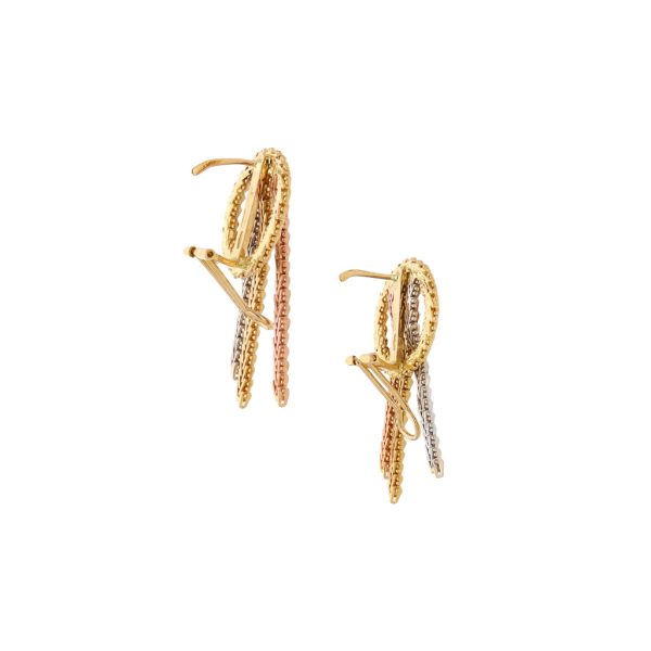 Aretes boleados con colgantes en oro tres tonos 18 kilates. Sale