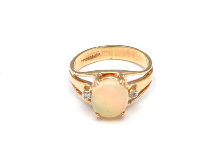 Anillo calado con diamantes y ópalo en oro amarillo 14 kilates. Online