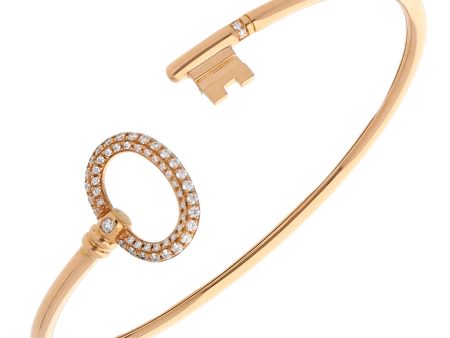 Pulsera ovalada abierta motivo llave con diamantes firma Tiffany & Co en oro rosa 18 kilates. Discount