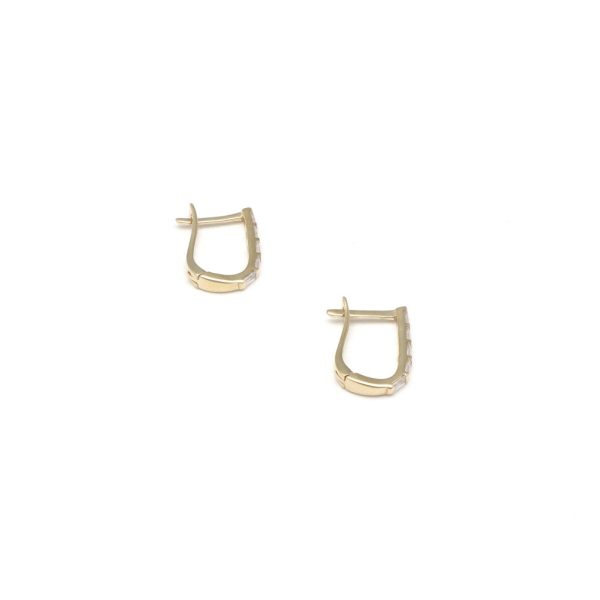 Aretes articulados con circonias en oro amarillo 14 kilates. Online now