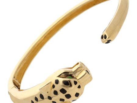 Pulsera articulada abierta motivo felino con esmalte en oro amarillo 14 kilates. Supply