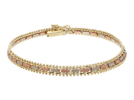 Pulsera boleada en oro tres tonos 14 kilates. Cheap